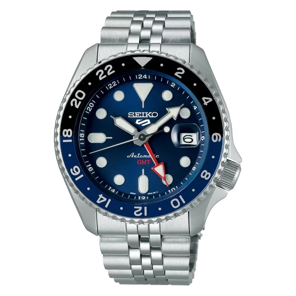 Zašto odabrati Seiko 5 Sports GMT SSK003K1? Inovativni GMT mehanizam: Idealan za putnike koji žele pratiti više vremenskih zona. Pouzdan automatski kalibar: Precizan i dugotrajan, sa 41-satnom rezervom snage. Elegantni plavi brojčanik: Savršeno se uklapa u svakodnevne i formalne kombinacije. Otpornost i trajnost: Vodootporan do 100 metara, s čvrstim staklom otpornim na ogrebotine. Vrijednost za novac: Kombinacija luksuza i praktičnosti po pristupačnoj cijeni. H2: Zanimljivost o proizvodu Seiko 5 Sports linija poznata je po svom nazivu "5", koji označava pet ključnih karakteristika: automatski mehanizam, vodootpornost, dan i datum prikaz, izdržljivo kućište i narukvicu te povoljnu cijenu. Model SSK003K1 nastavlja ovu tradiciju uz dodatak GMT funkcije koja ga izdvaja među ljubiteljima Seiko satova. H2: Najčešća pitanja (FAQ) o Seiko 5 Sports GMT SSK003K1 1. Da li je ovaj sat dobar za putovanja? Da, zahvaljujući GMT funkciji, možete lako pratiti dvije vremenske zone istovremeno. 2. Koja je razlika između Hardlex i safirnog stakla? Hardlex je Seikova vlastita vrsta stakla otporna na udarce i ogrebotine, dok je safirno staklo još otpornije, ali skuplje. 3. Kako održavati automatski sat? Automatski sat zahtijeva redovno nošenje ili povremeno navijanje kako bi ostao u funkciji. Preporučuje se servis svakih 3-5 godina. 4. Da li je ovaj model uniseks? Iako je dizajniran za muškarce, zahvaljujući svom univerzalnom dizajnu i veličini, mogu ga nositi i žene. 5. Koliko traje rezerva snage? Seiko 5 Sports GMT SSK003K1